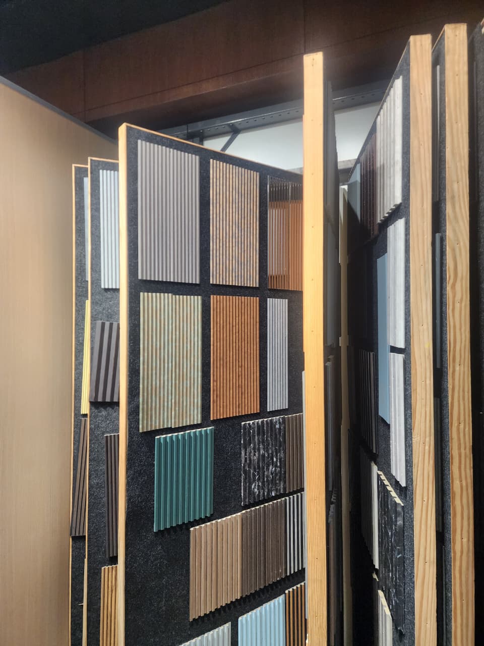 Textured decorative panel samples on display